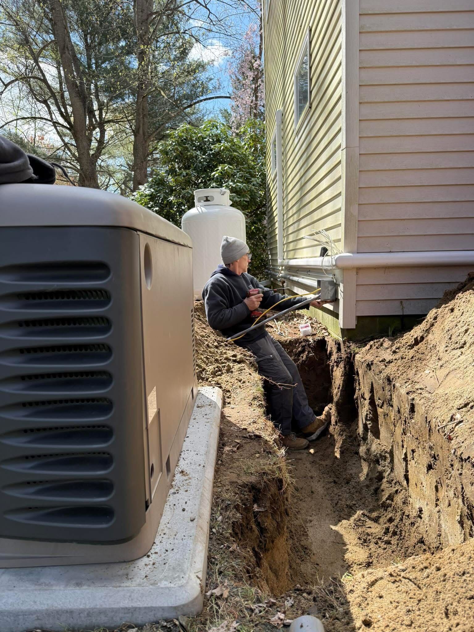 technician wiring residential generator, Andrus Power Solutions